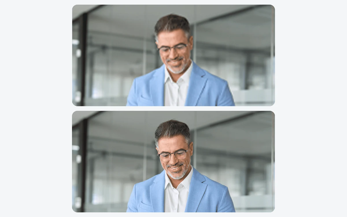 A grey-haired man with glasses in a light blue blazer shown twice in an office, slightly blurred on top and sharp below