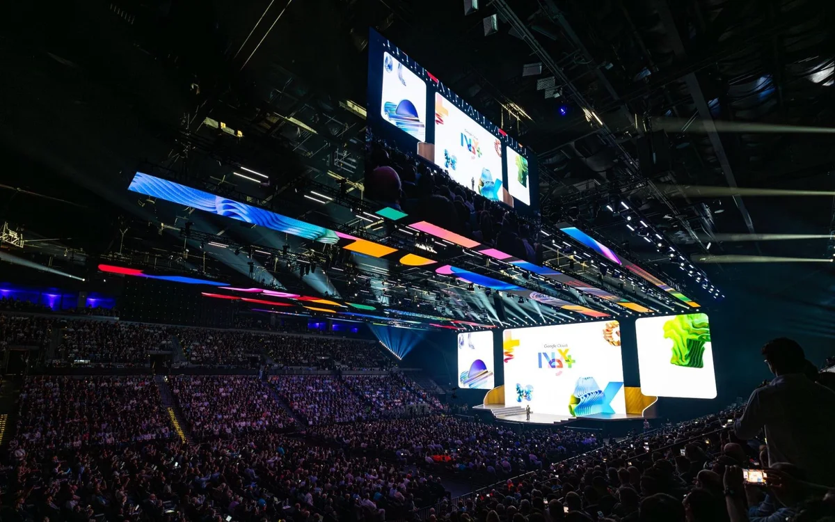 Crowded keynote arena at Google Cloud Next 2026 with the stage and large hanging screens