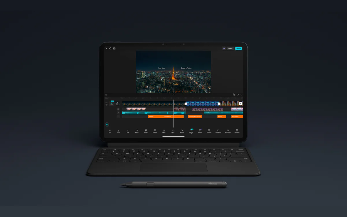 Alexa Tablet 12 Pro running a video editor on the Pro Keyboard, with the Pro Pen lying in front