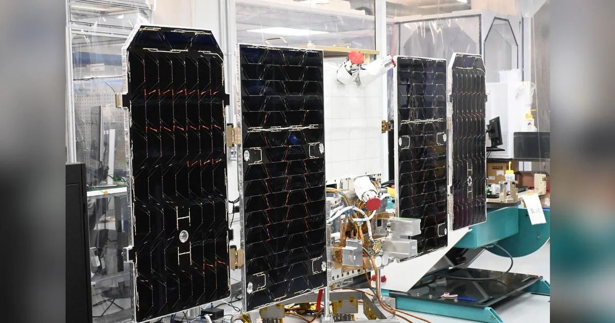 The Project Suncatcher prototype satellite on a stand inside Planet's facility in San Francisco