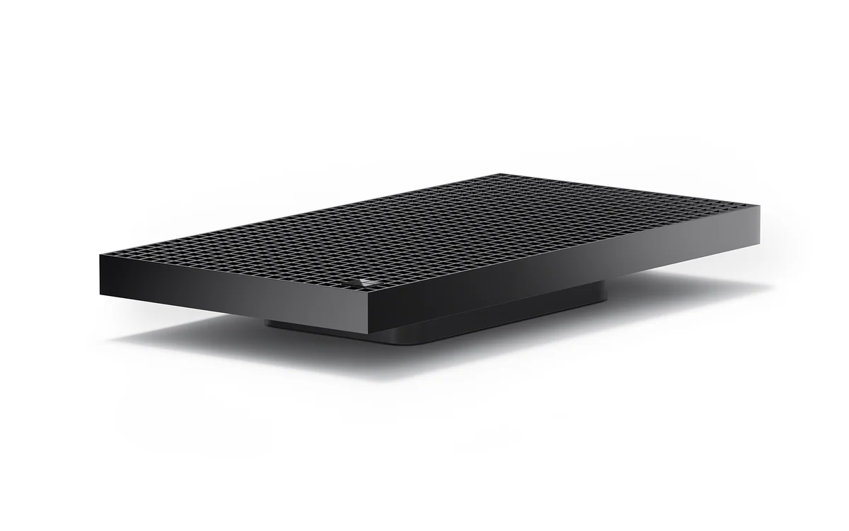 Angled view of the compact Surface RTX Spark Dev Box desktop