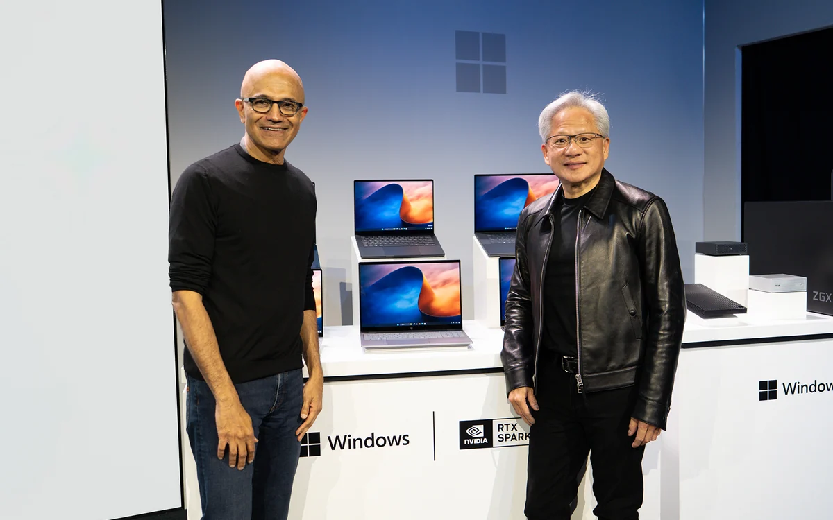Satya Nadella and Jensen Huang on stage at the Microsoft event in San Francisco