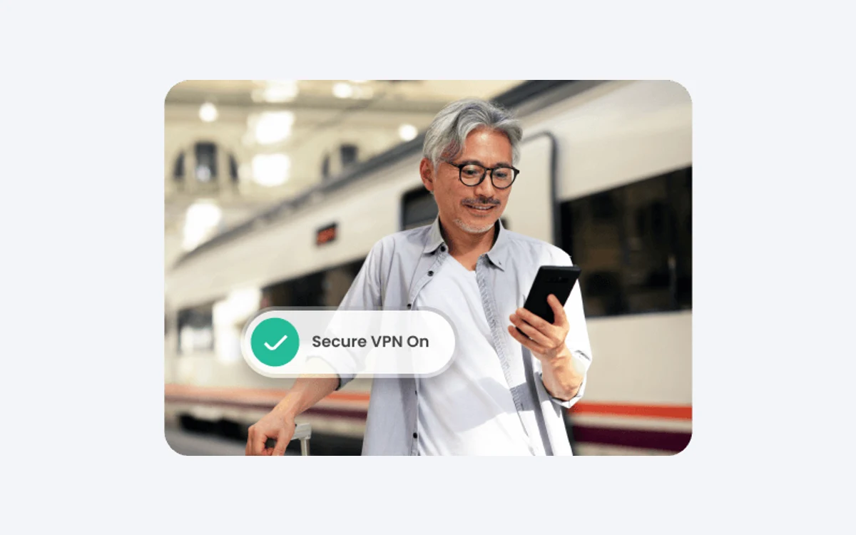 Man at a train station holding a phone, with a McAfee overlay reading Secure VPN On